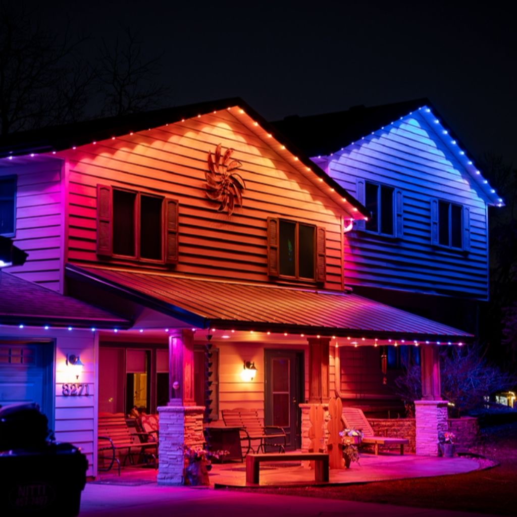 Permanent blue and white roofline lighting installation on Kansas City home 4