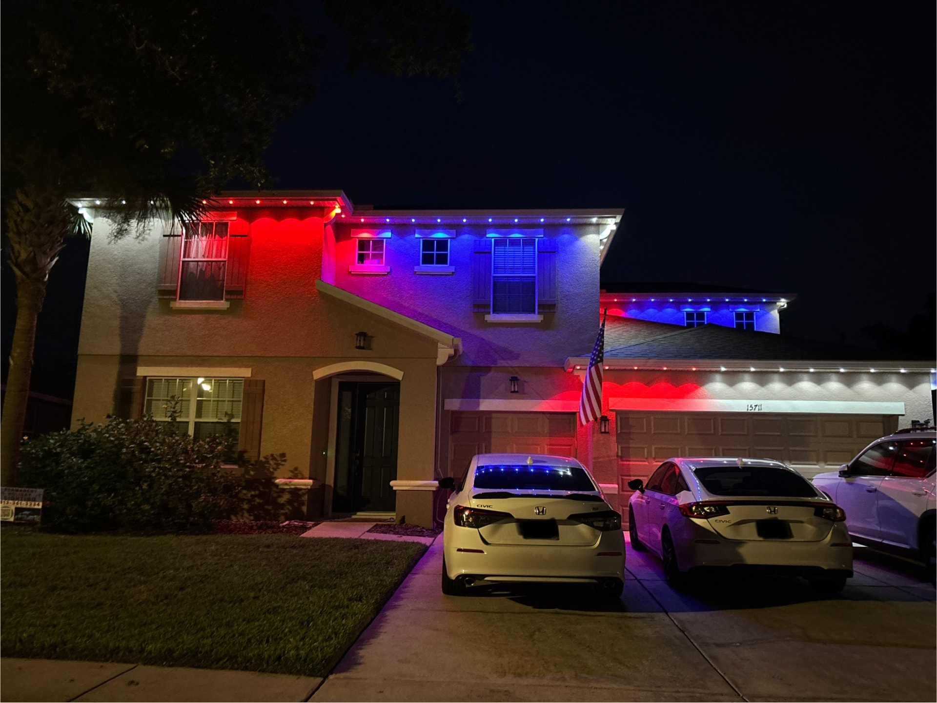Permanent blue and white roofline lighting installation on Kansas City home 3